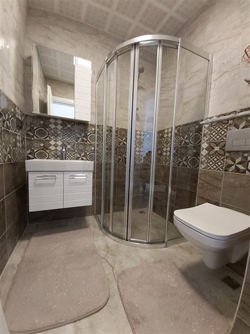 Двухкомнатная абсолютно новая квартира в Махмутларе