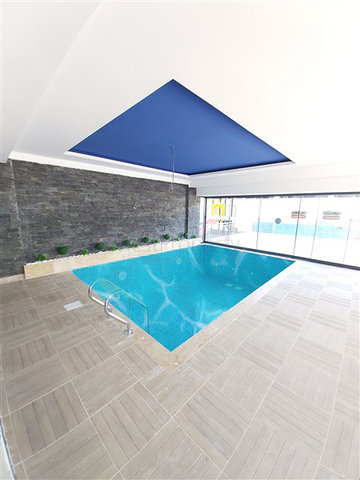 Двухкомнатная абсолютно новая квартира в Махмутларе