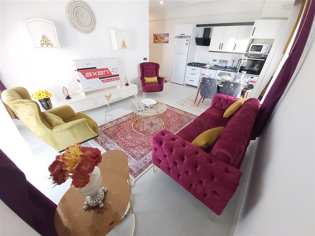 Двухкомнатная абсолютно новая квартира в Махмутларе