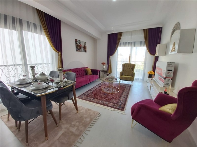 Двухкомнатная абсолютно новая квартира в Махмутларе