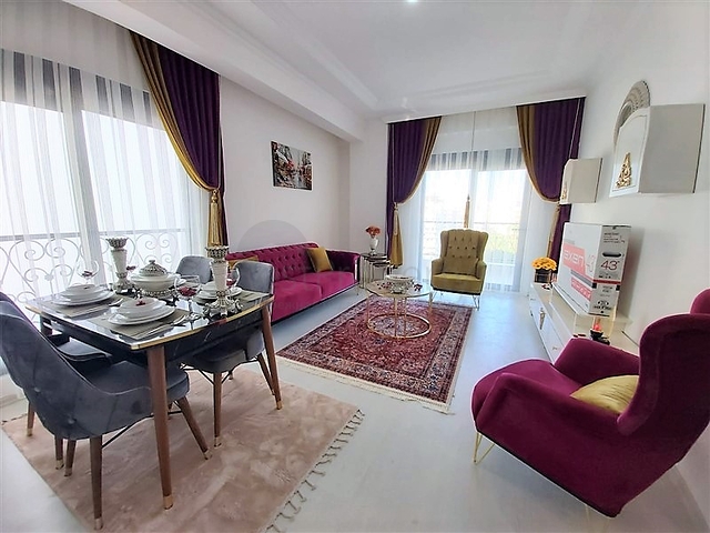 Двухкомнатная абсолютно новая квартира в Махмутларе