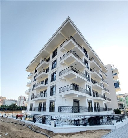 Двухкомнатная абсолютно новая квартира в Махмутларе