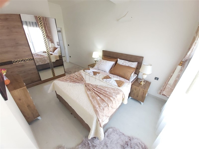 Двухкомнатная абсолютно новая квартира в Махмутларе