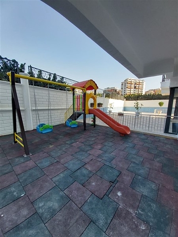 Двухкомнатная абсолютно новая квартира в Махмутларе