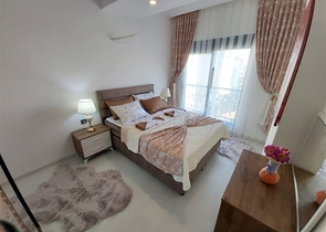 Двухкомнатная абсолютно новая квартира в Махмутларе