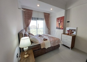 Двухкомнатная абсолютно новая квартира в Махмутларе