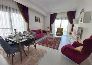 Двухкомнатная абсолютно новая квартира в Махмутларе