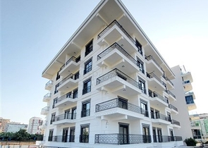 Двухкомнатная абсолютно новая квартира в Махмутларе