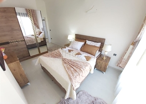 Двухкомнатная абсолютно новая квартира в Махмутларе