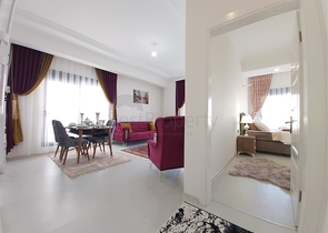 Двухкомнатная абсолютно новая квартира в Махмутларе