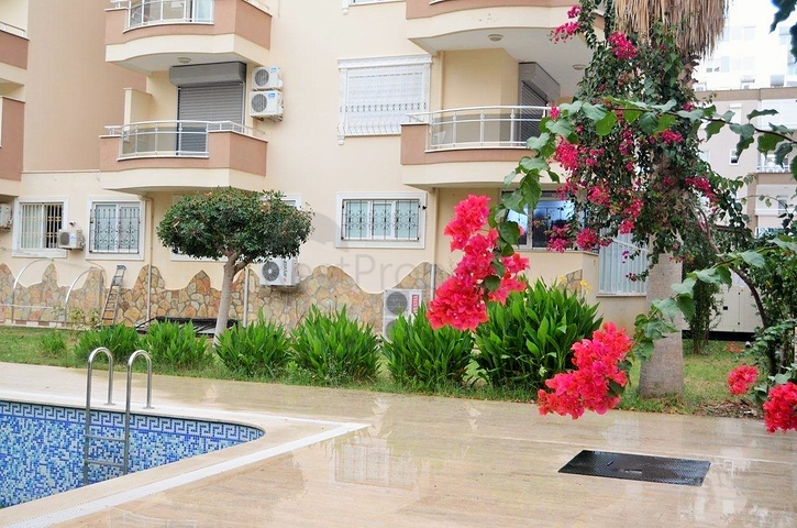 Меблированная квартира 2+1 с видом на море в районе Махмутлар