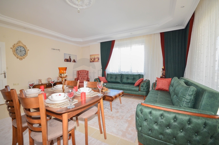 Меблированная квартира 2+1 с видом на море в районе Махмутлар