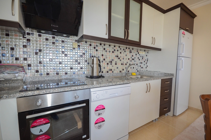 Меблированная квартира 2+1 с видом на море в районе Махмутлар