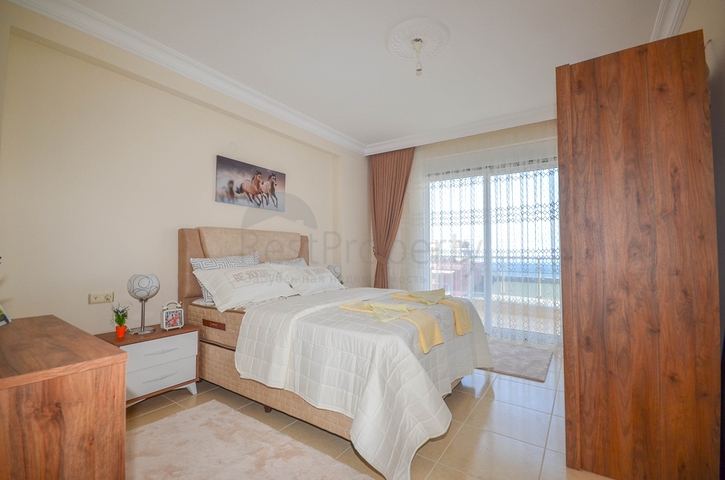 Меблированная квартира 2+1 с видом на море в районе Махмутлар