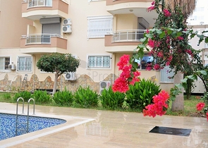 Меблированная квартира 2+1 с видом на море в районе Махмутлар