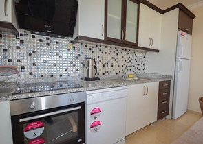 Меблированная квартира 2+1 с видом на море в районе Махмутлар