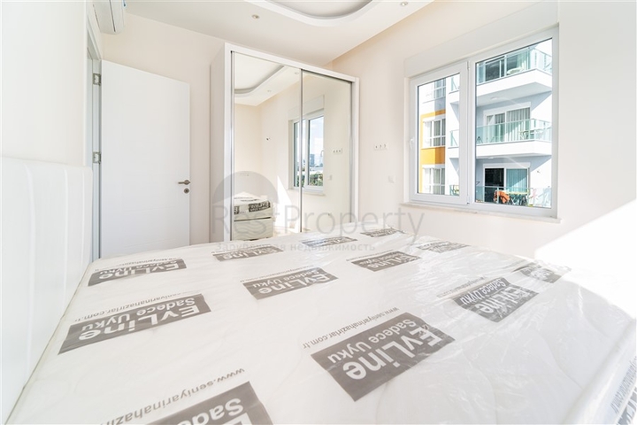 Просторная двухкомнатная квартира в районе Махмутлар