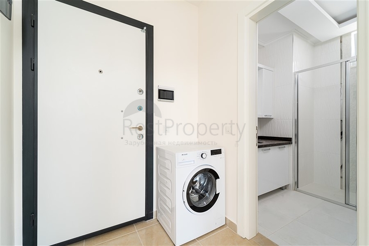 Просторная двухкомнатная квартира в районе Махмутлар