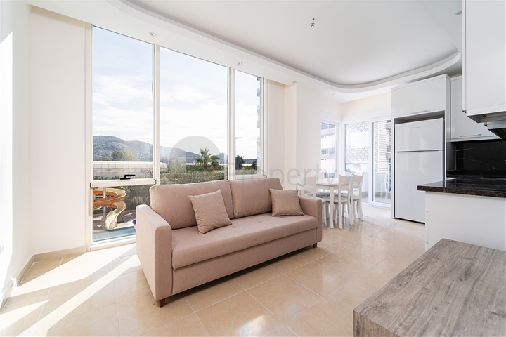 Просторная двухкомнатная квартира в районе Махмутлар