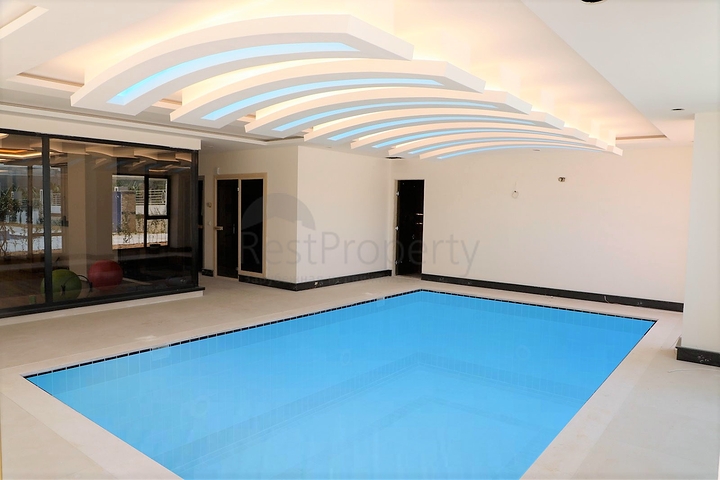 Просторная двухкомнатная квартира в районе Махмутлар