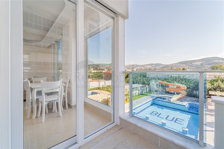 Просторная двухкомнатная квартира в районе Махмутлар