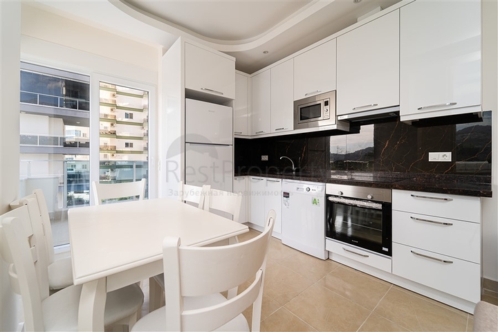 Просторная двухкомнатная квартира в районе Махмутлар