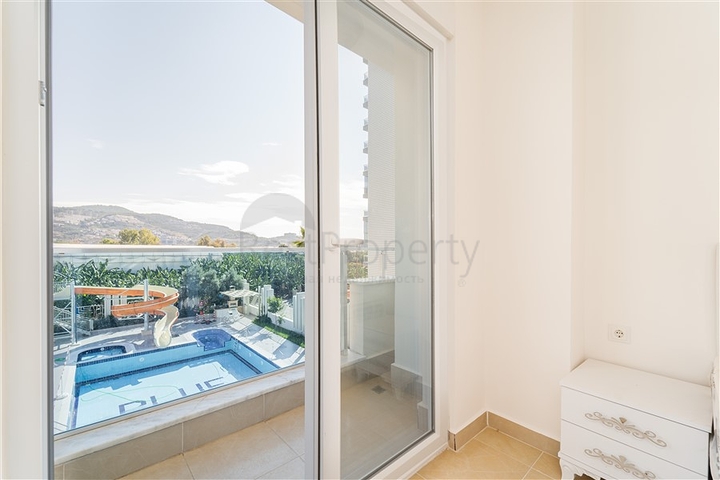 Просторная двухкомнатная квартира в районе Махмутлар