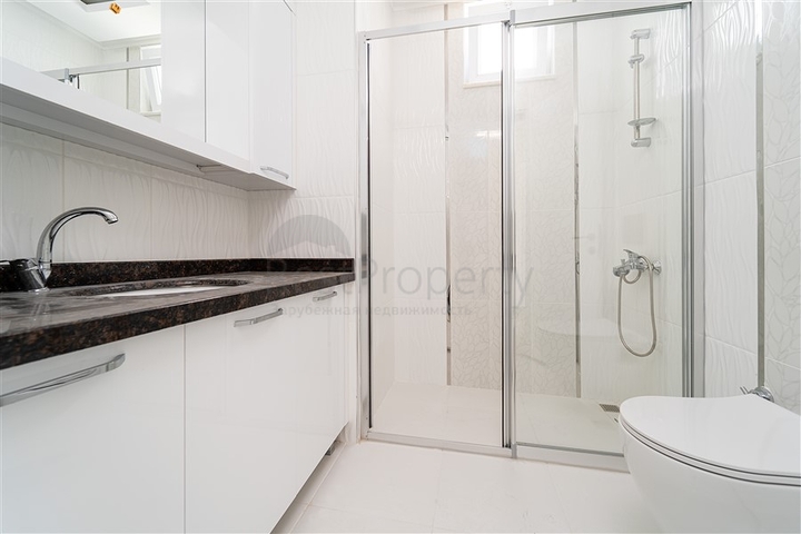 Просторная двухкомнатная квартира в районе Махмутлар