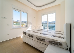 Просторная двухкомнатная квартира в районе Махмутлар