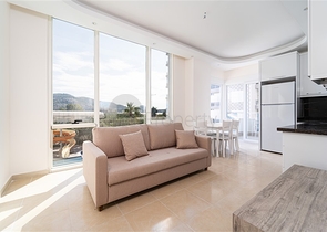 Просторная двухкомнатная квартира в районе Махмутлар