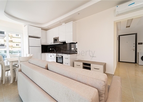 Просторная двухкомнатная квартира в районе Махмутлар