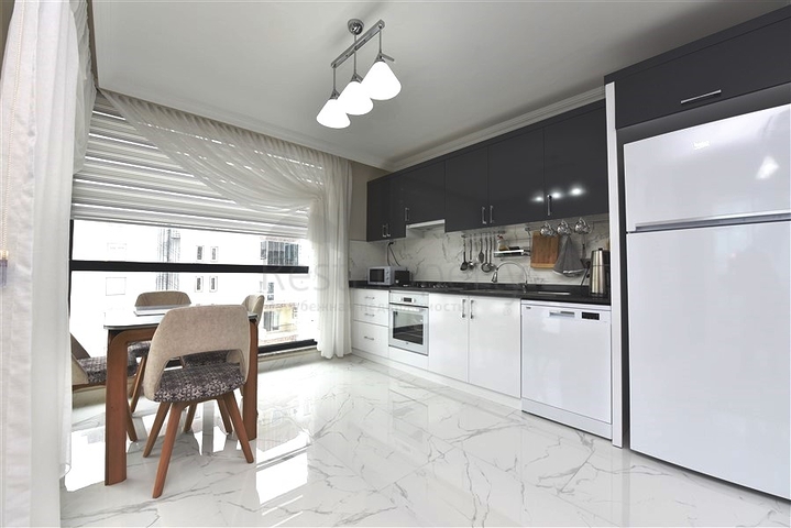 Меблированная квартира 2+1 в новом комплексе в центре Махмутлара