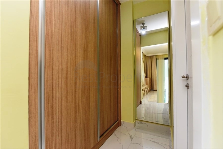 Меблированная квартира 2+1 в новом комплексе в центре Махмутлара