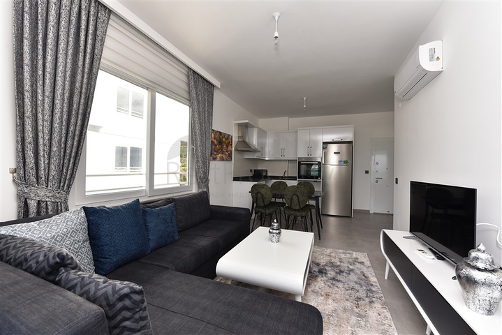 Двухкомнатная меблированная квартира в новом комплексе района Махмутлар