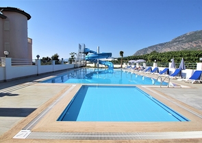 Двухкомнатная меблированная квартира в новом комплексе района Махмутлар