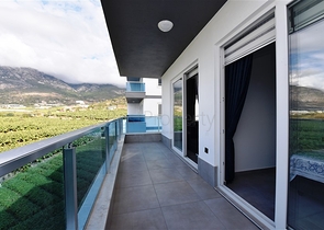 Двухкомнатная меблированная квартира в новом комплексе района Махмутлар