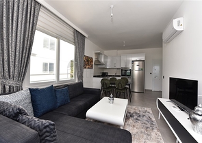 Двухкомнатная меблированная квартира в новом комплексе района Махмутлар