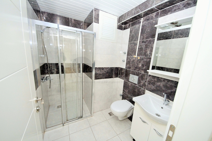 Двухкомнатная квартира в районе Махмутлар