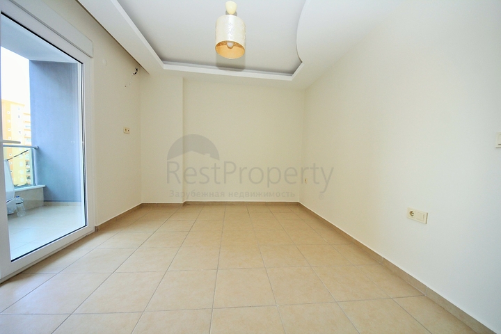 Двухкомнатная квартира в районе Махмутлар