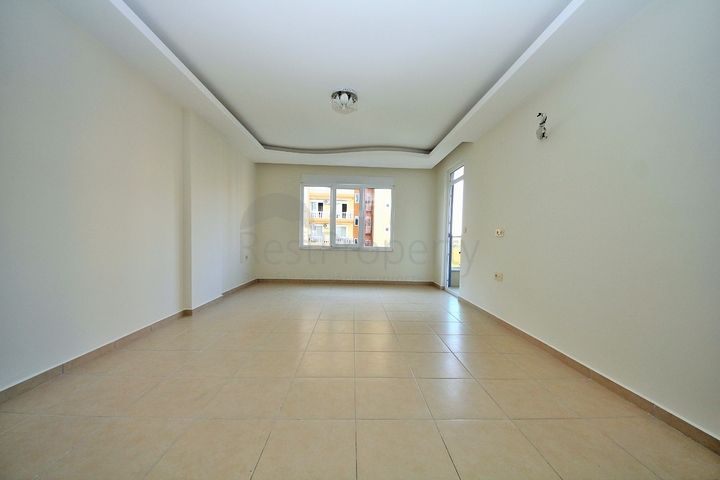 Двухкомнатная квартира в районе Махмутлар