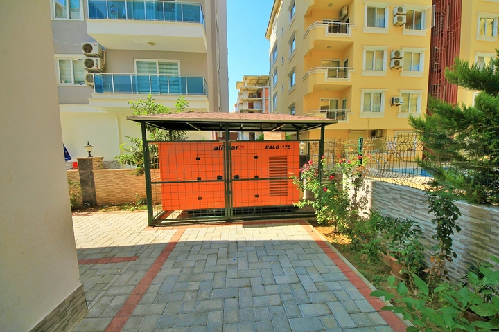 Двухкомнатная квартира в районе Махмутлар