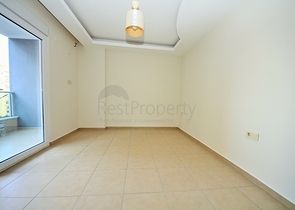 Двухкомнатная квартира в районе Махмутлар