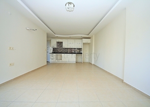 Двухкомнатная квартира в районе Махмутлар