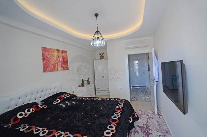 Двухкомнатная квартира в районе Махмутлар