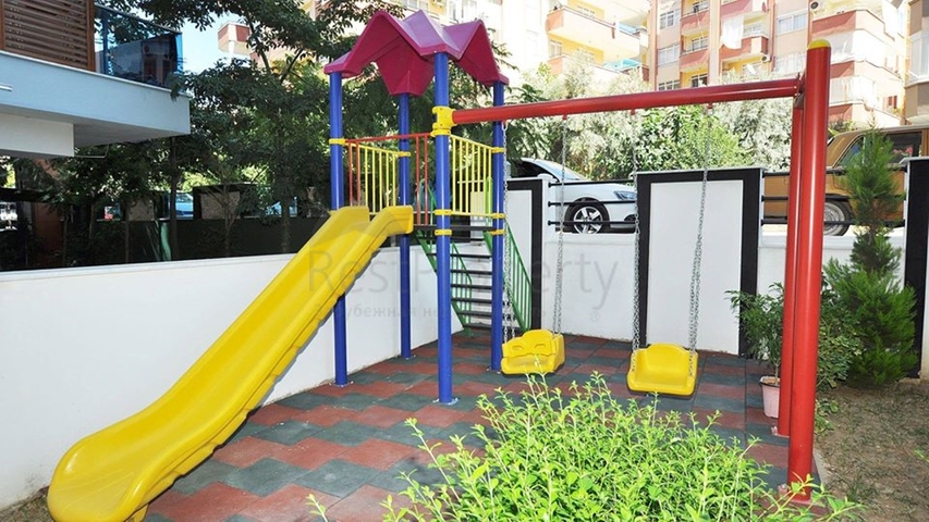 Двухкомнатная квартира в районе Махмутлар