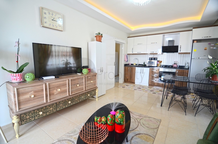 Двухкомнатная квартира в районе Махмутлар