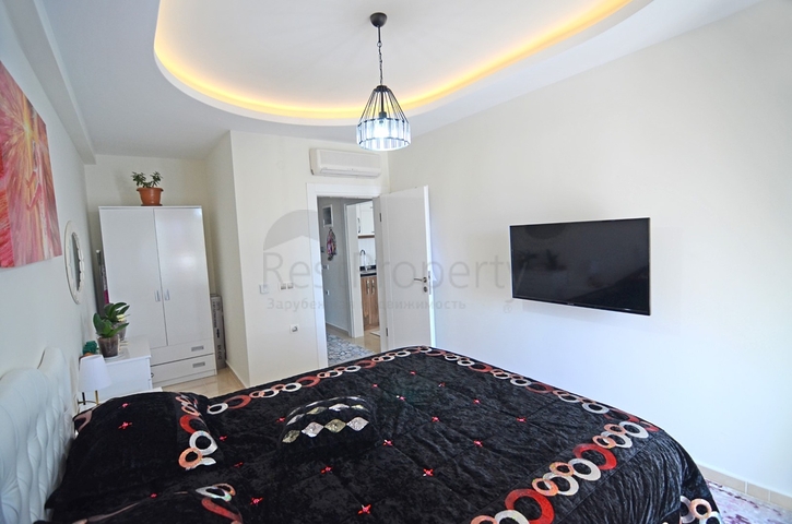 Двухкомнатная квартира в районе Махмутлар