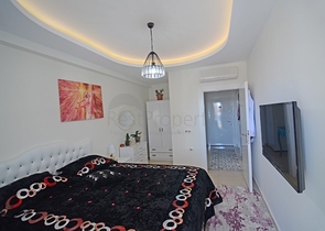 Двухкомнатная квартира в районе Махмутлар