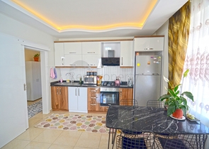 Двухкомнатная квартира в районе Махмутлар