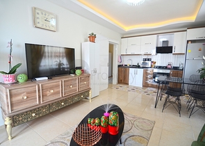 Двухкомнатная квартира в районе Махмутлар